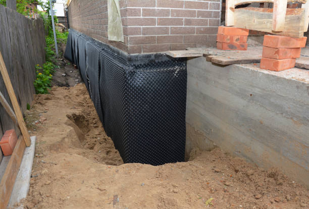 Happy homeowners after waterproofing job in Bolingbrook